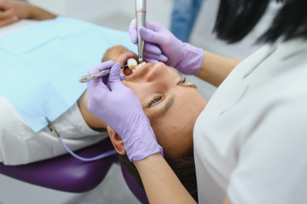 dental care concept handsome young guy at the den 2026 01 09 00 53 20 utc